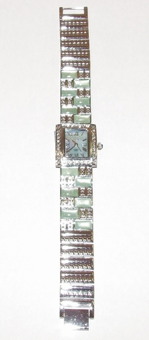 Horloge met groene steentjes en heldere strass